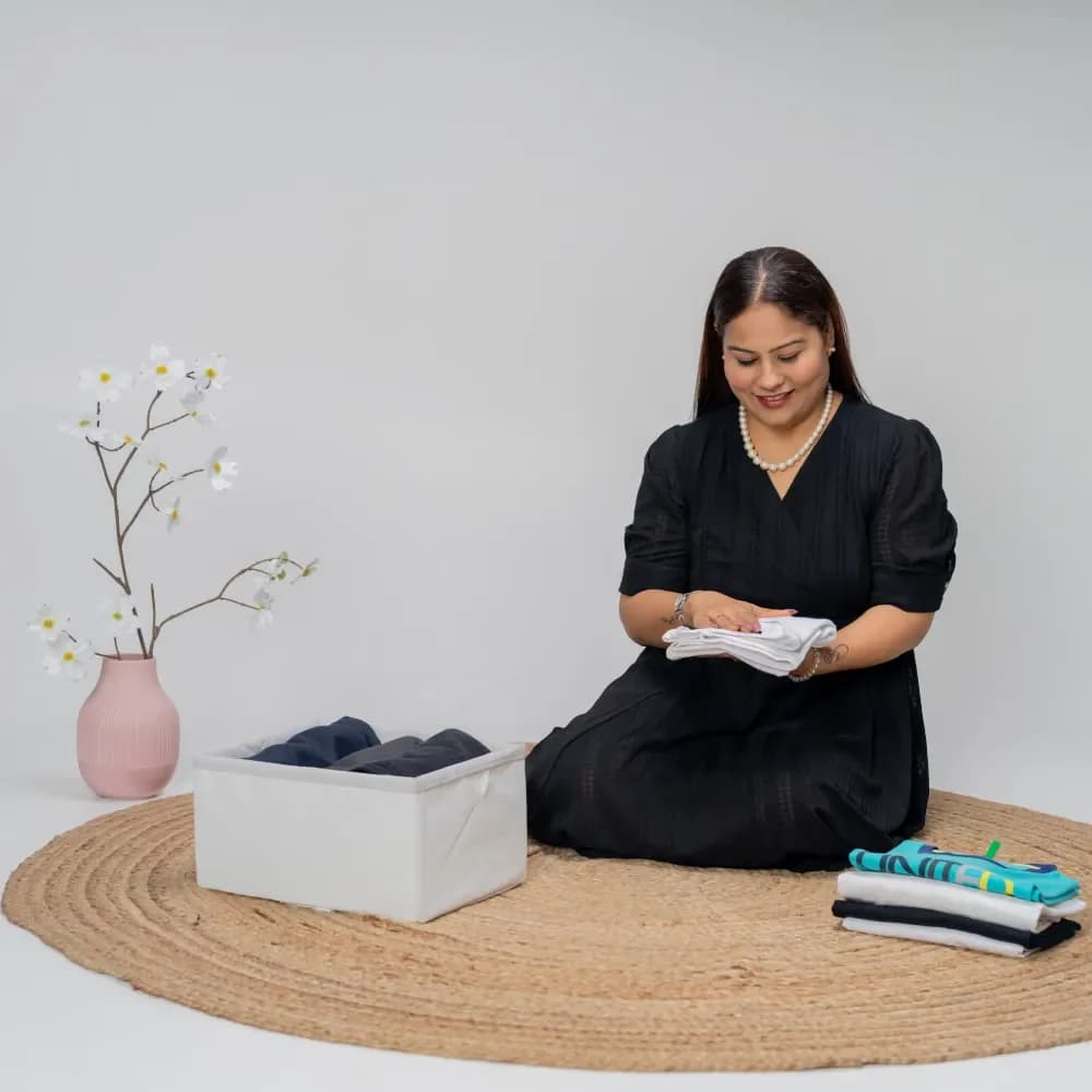 Rachna Kacker, founder of Messmerize India, organizing a client's wardrobe